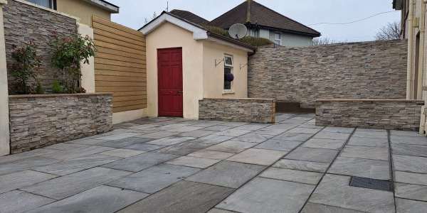 Revamping a Residential Exterior with Stone Grenada Frost: A Stunning Project Completed by our Business Partner